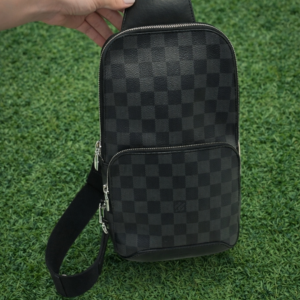 Louis Vuitton Avenue Sling Bag in Damier Graphite.